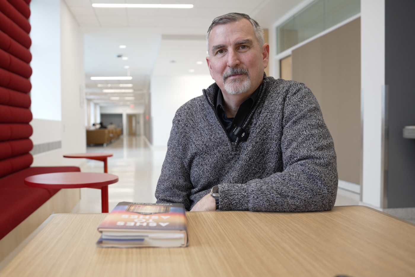 Thomas Maltman with his award-winning book Ashes to Ashes
